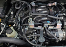 Load image into Gallery viewer, J&amp;L 16-22 Nissan Titan 5.6L Passenger Side Oil Separator 3.0 - Black Anodized
