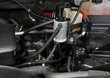Load image into Gallery viewer, J&amp;L 20-22 Chevy Silverado/GMC Sierra 2500/3500 6.6L Drivers Side Oil Separator 3.0 - Clear Anodi
