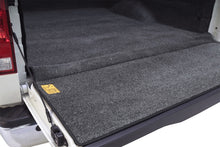 Load image into Gallery viewer, BedRug 04-15 Nissan Titan Crew Cab Bedliner